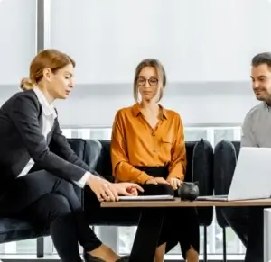 people sitting around a conference table